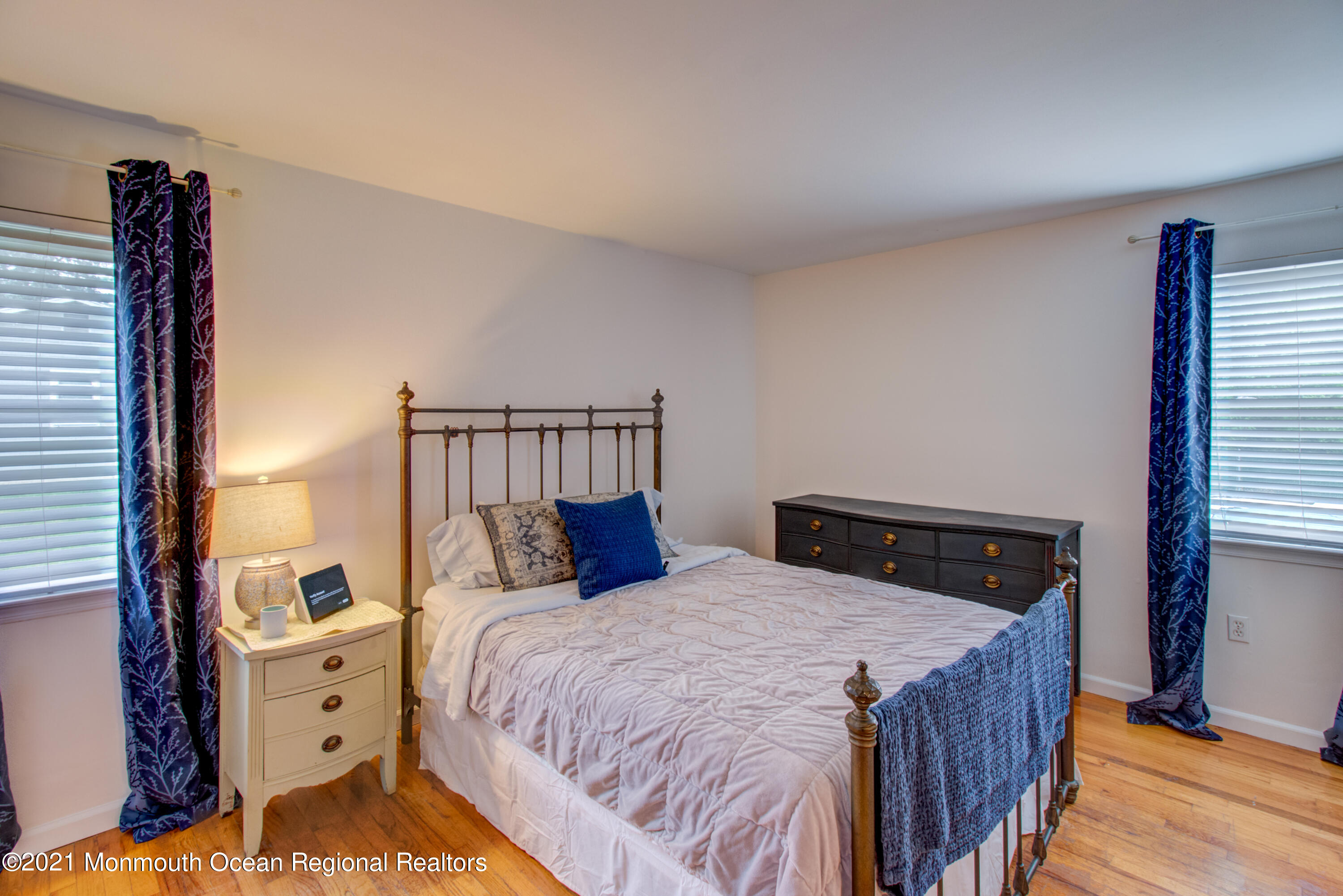 463 Flock Road Hamilton, NJ 08619 - Photo 15 of 24 a bedroom with a bed and wooden floor