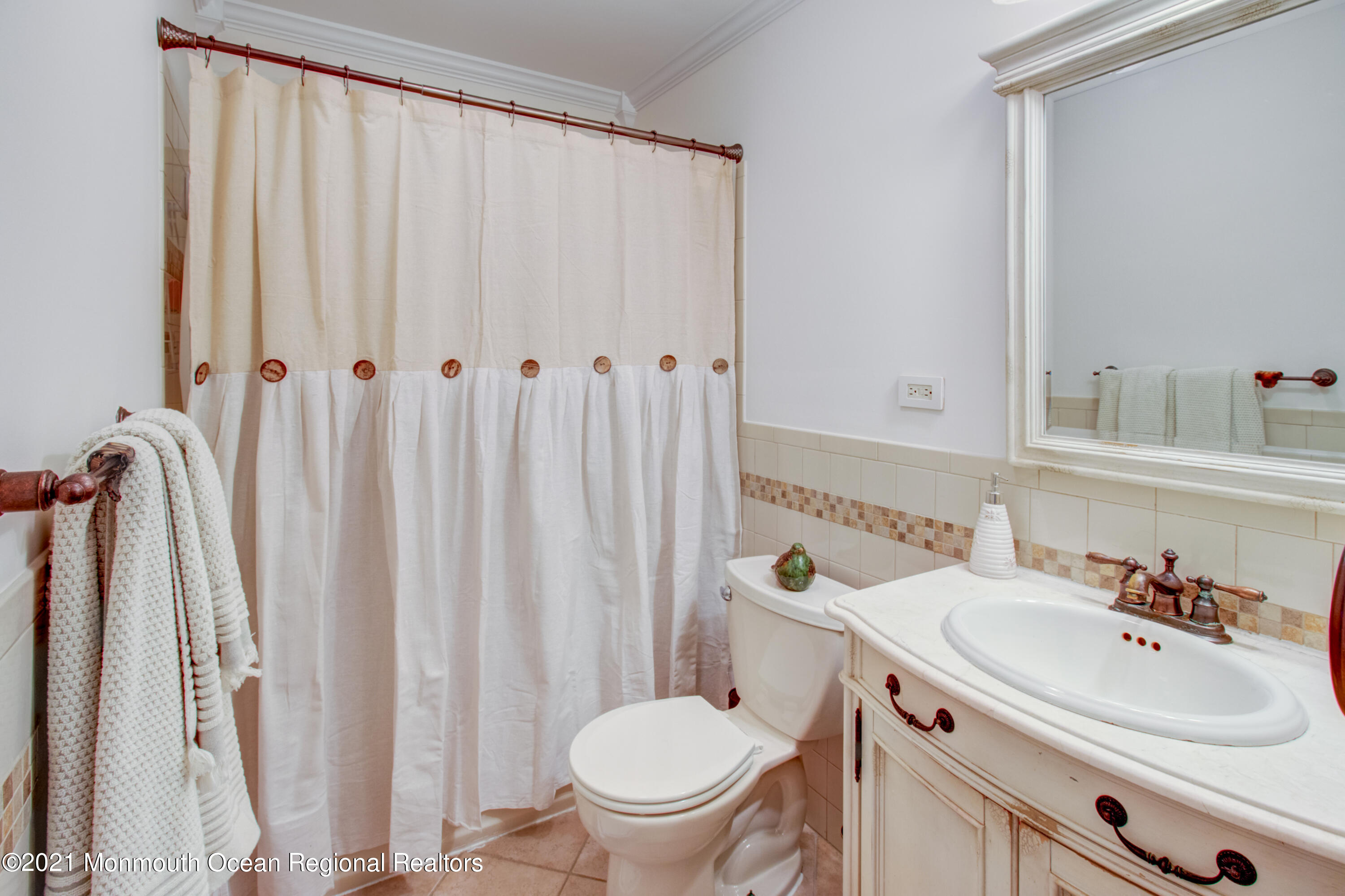 463 Flock Road Hamilton, NJ 08619 - Photo 18 of 24 a bathroom with a sink toilet and a mirror