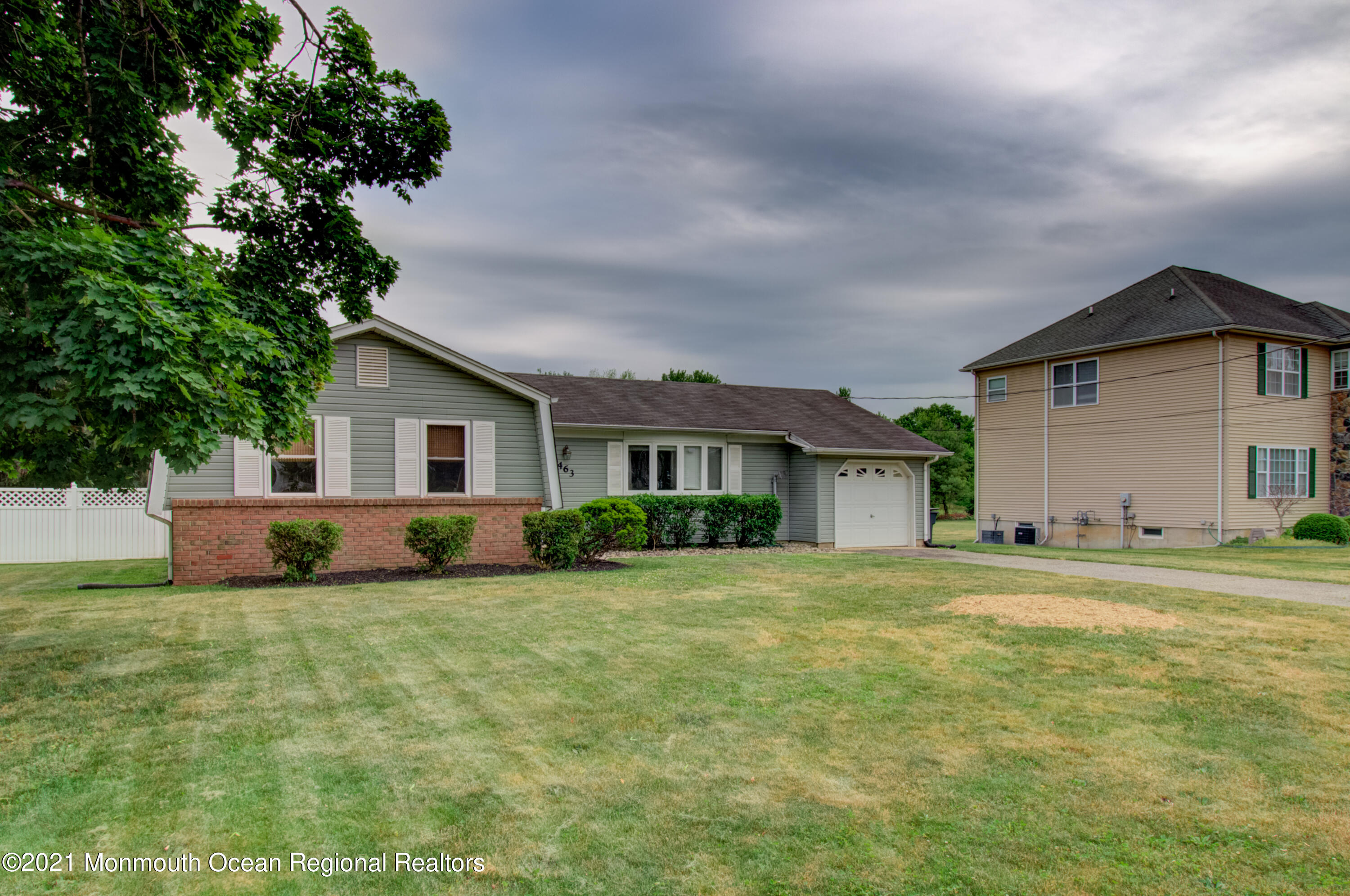 463 Flock Road Hamilton, NJ 08619 - Photo 23 of 24 a front view of a house with a yard and garage