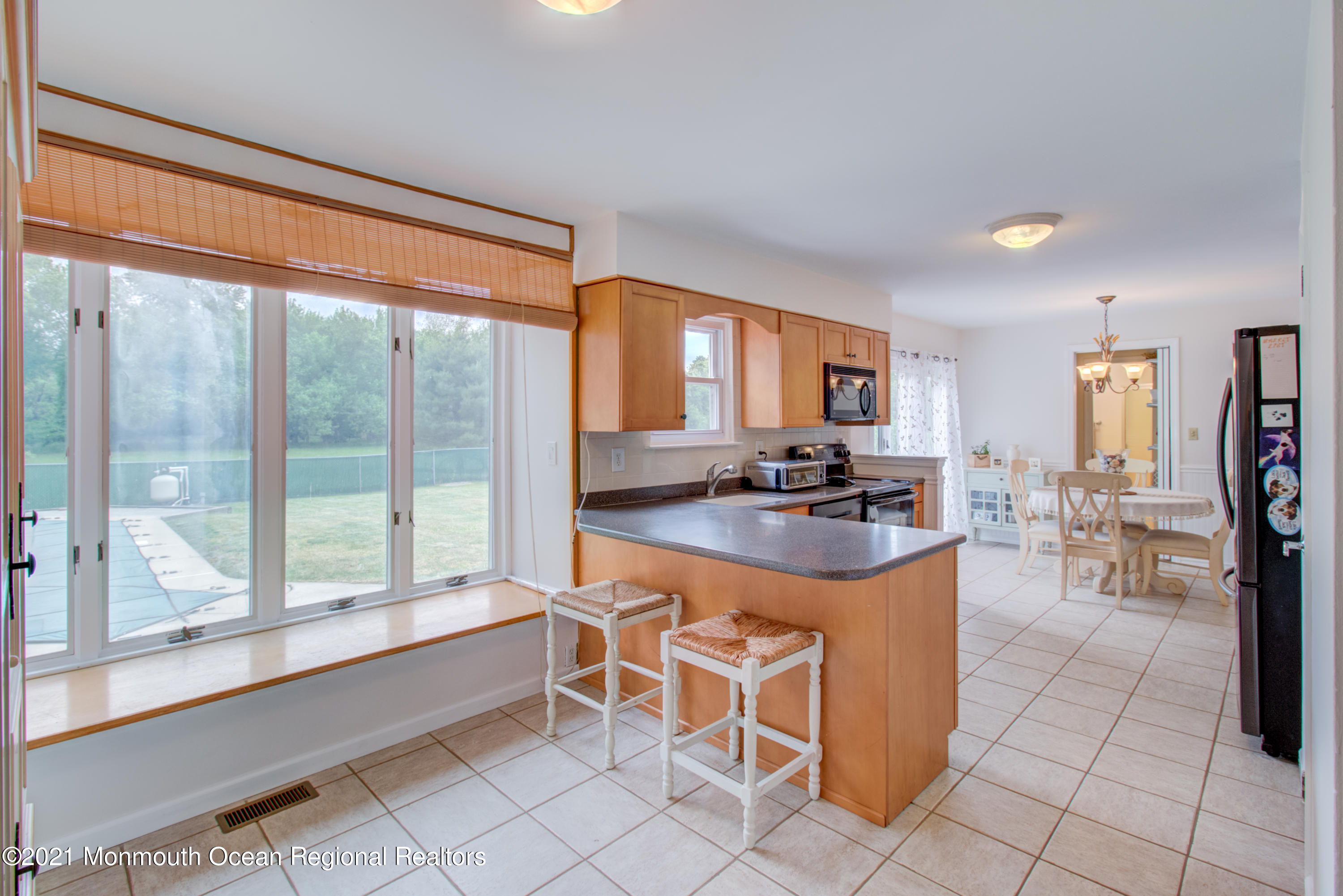 463 Flock Road Hamilton, NJ 08619 - Photo 9 of 24 a kitchen with granite countertop a sink and cabinets