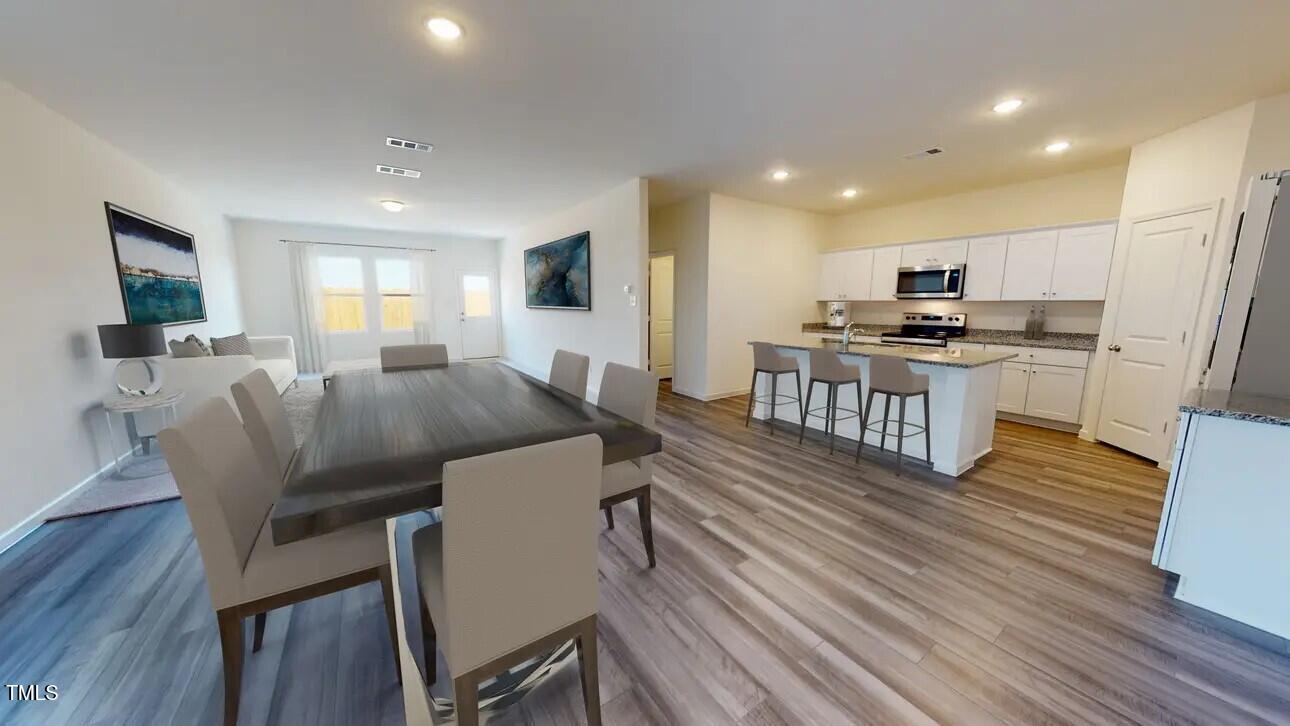 1224 Solace Way Rolesville, NC 27571 - Photo 4 of 20 Apollo- Kitchen-Dining- Living