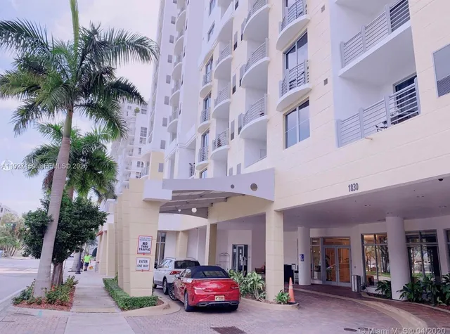 a city street lined with tall buildings