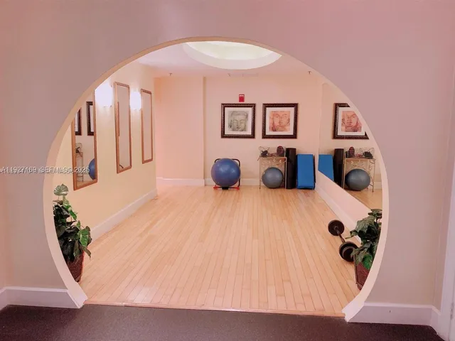 a view of a livingroom with furniture and stairs