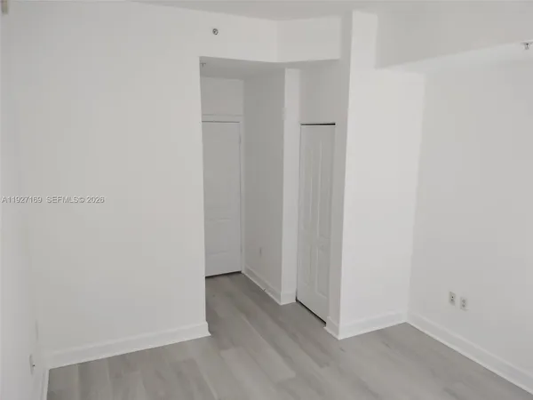 an empty room with windows