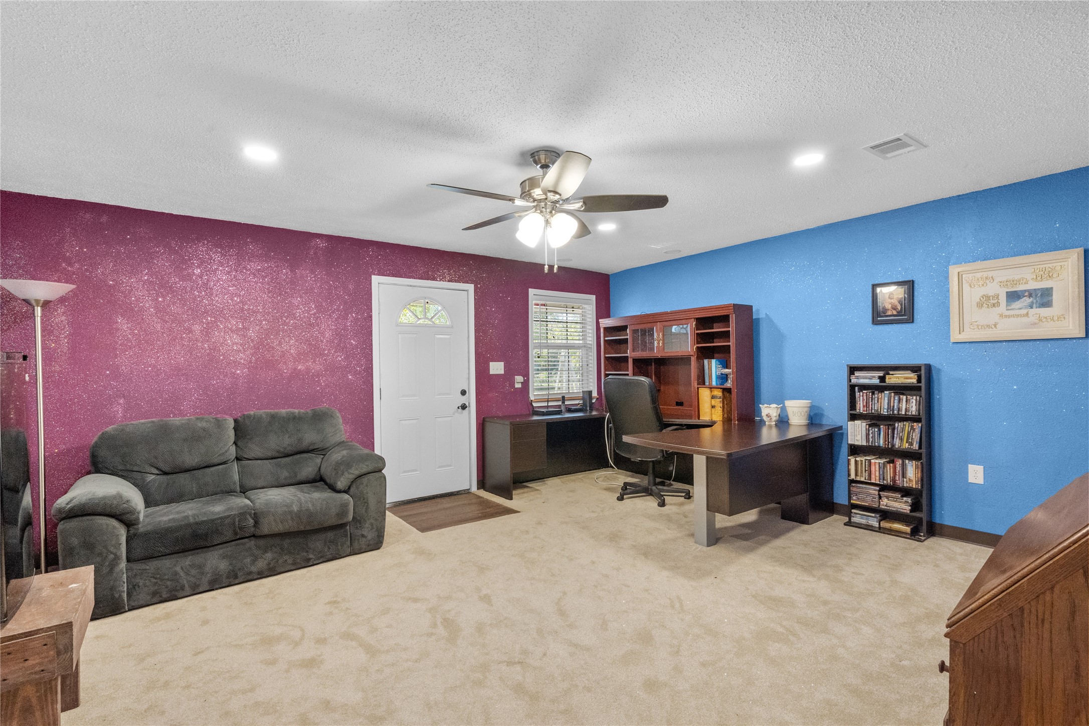 194 County Road 2775 Colmesneil, TX 75938 - Photo 15 of 22 a living room with furniture and a flat screen tv
