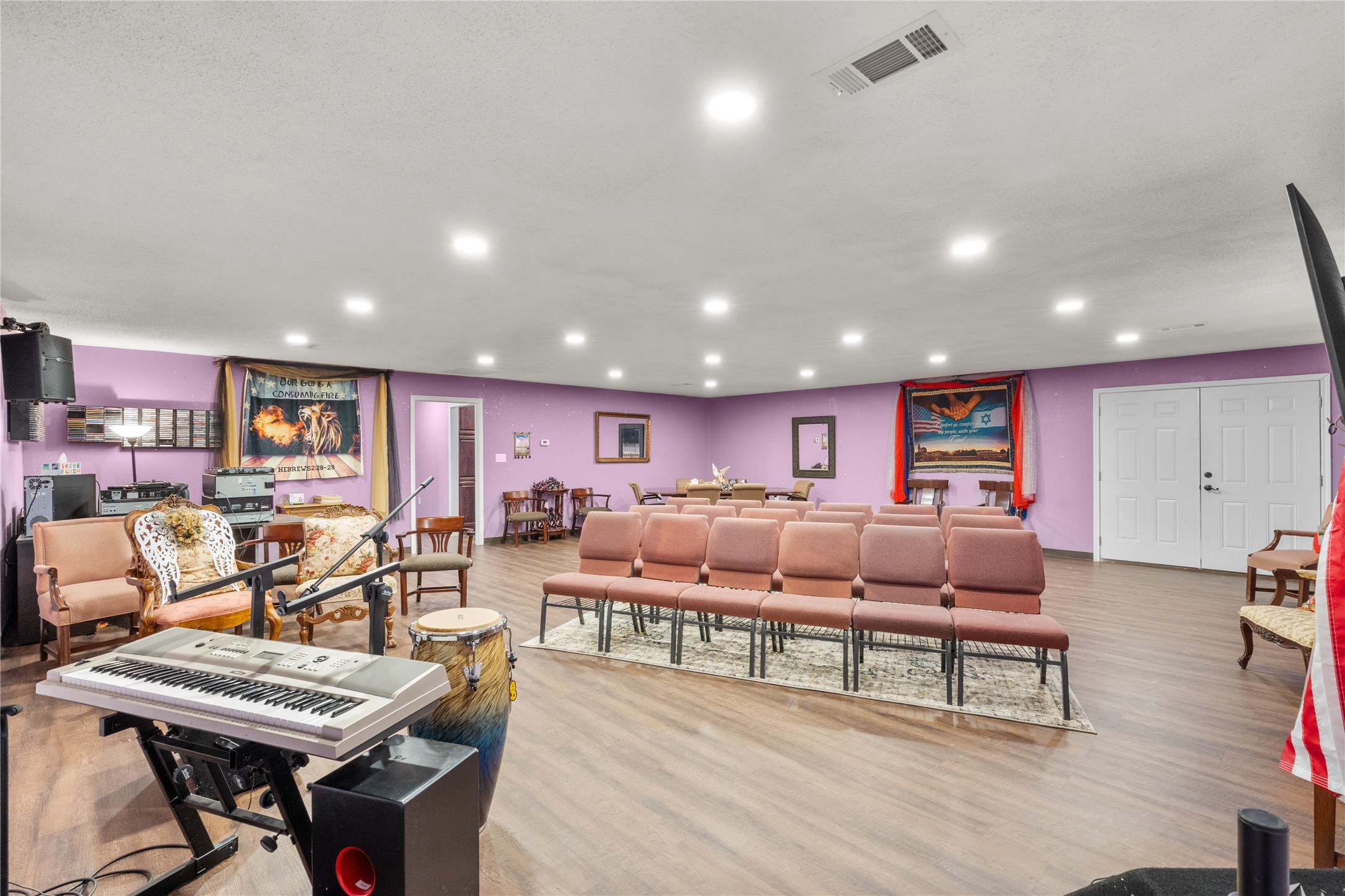 194 County Road 2775 Colmesneil, TX 75938 - Photo 6 of 22 a living room with lots of furniture and a wooden floor