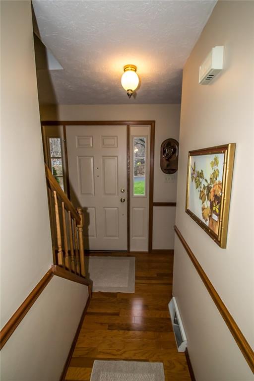 Gleaming hardwood floors with chair rail.