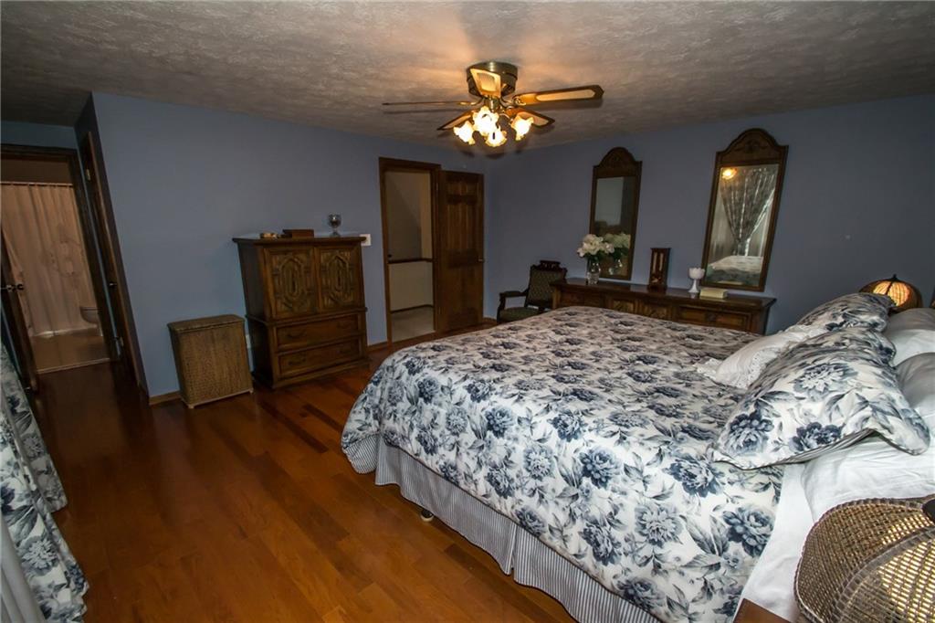 1880 Ferguson Road Allison Park, PA 15101 - Photo 16 of 24 Master bedroom with hardwood flooring with a updated master bath.