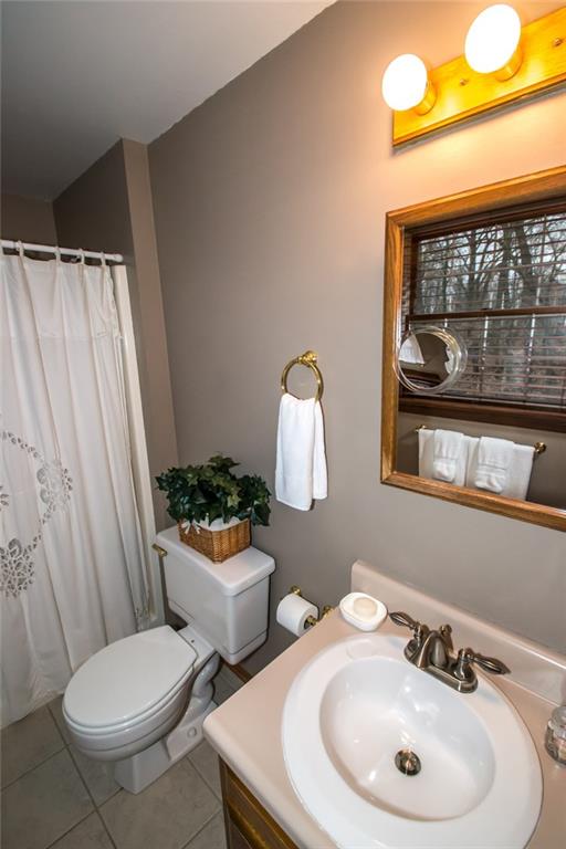 1880 Ferguson Road Allison Park, PA 15101 - Photo 17 of 24 The master bathroom has ceramic tile, a four ft shower and a window.