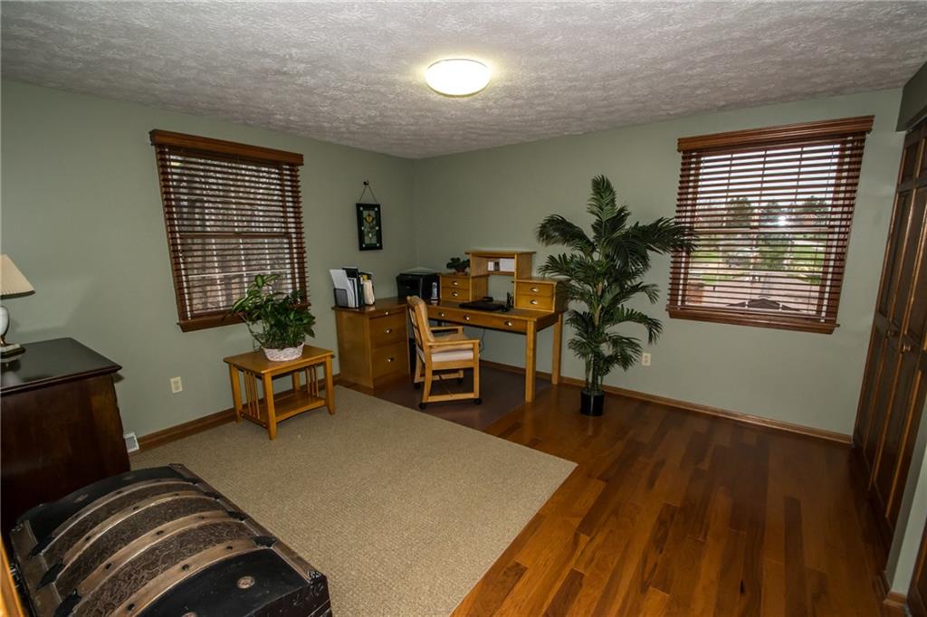 1880 Ferguson Road Allison Park, PA 15101 - Photo 21 of 24 The fourth bedroom currently used as an office has hardwood flooring and a large closet.