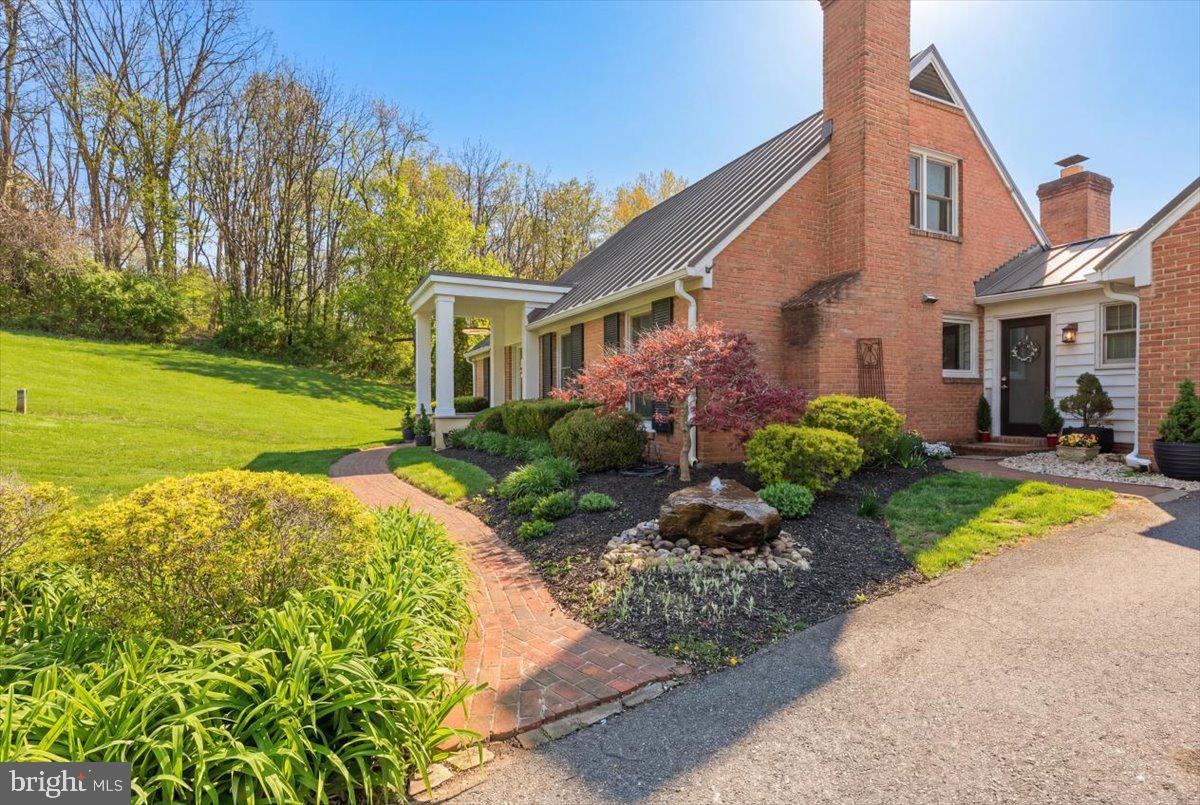 6501 Green Valley Road New Market, MD 21774 - Photo 7 of 55 Beautiful fountain & walkway to covered portico!