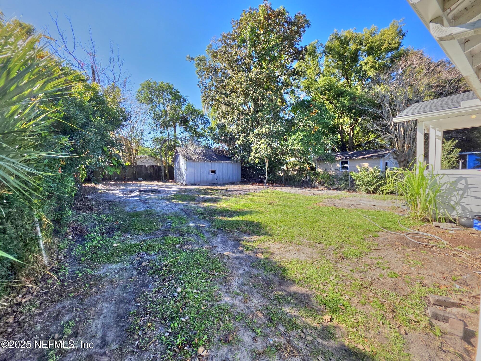 616 Woodbine Street Jacksonville, FL 32206 - Photo 24 of 25 a view of a house with a yard