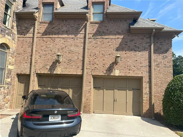 front view of a house with a small yard