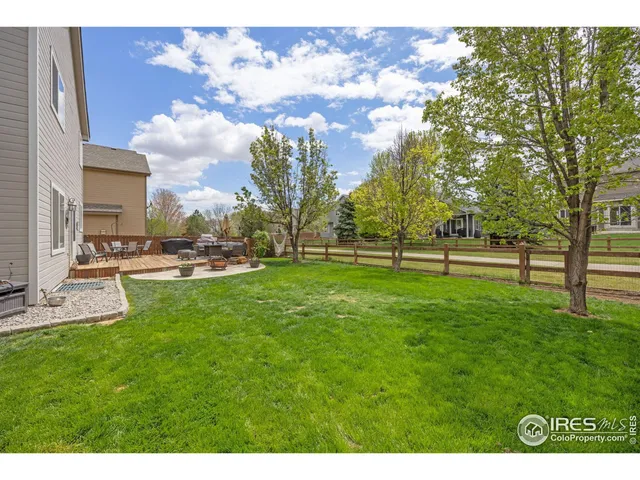 an aerial view of a house with a swimming pool