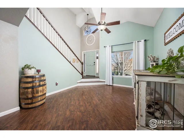 a view of entryway with wooden floor