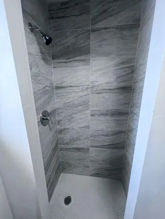 a bathroom with a toilet and a sink
