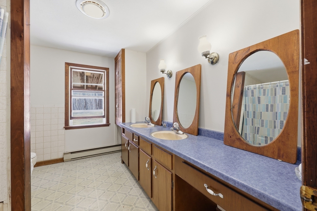 240 Upper Road Deerfield, MA 01342 - Photo 16 of 42 a view of bathroom with dual sinks
