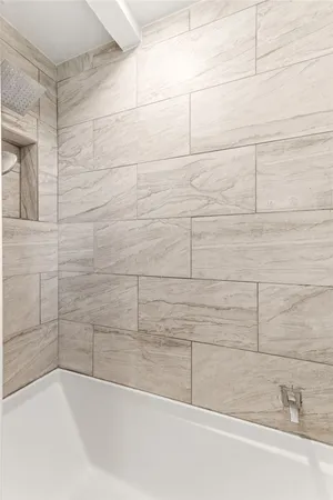 a bathroom with a bathtub
