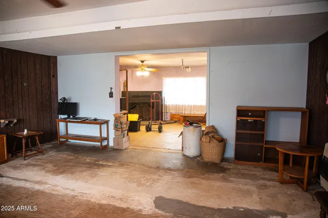 a view of livingroom with furniture and staircase