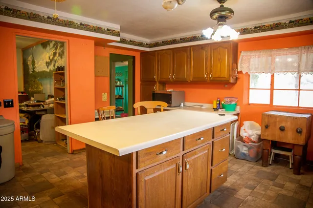 a bathroom with a shower and a sink