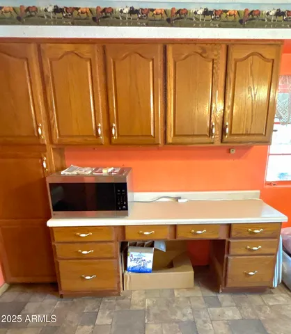 a view of a bathroom with a tub and mirror