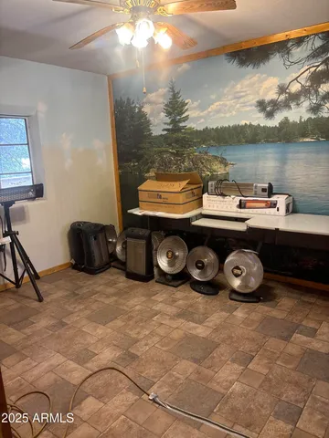 a spacious bathroom with a double vanity sink a mirror and a bathtub