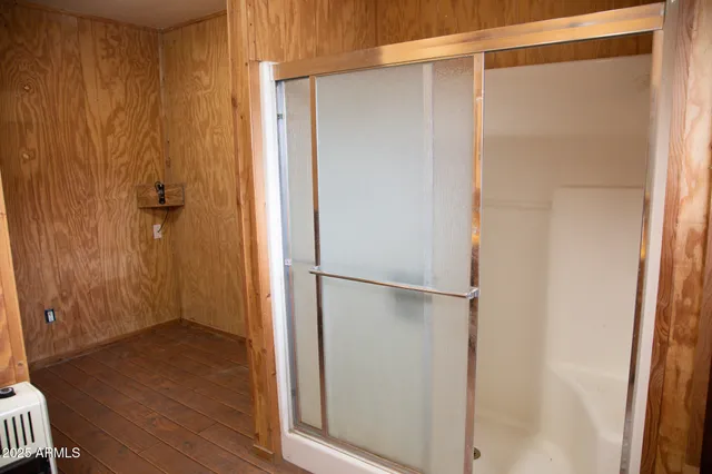 a view of a house with snow on the background