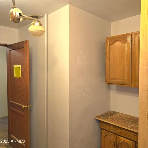 a room with furniture and a large window