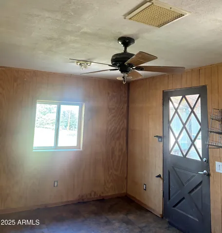 a view of a backyard with sitting area