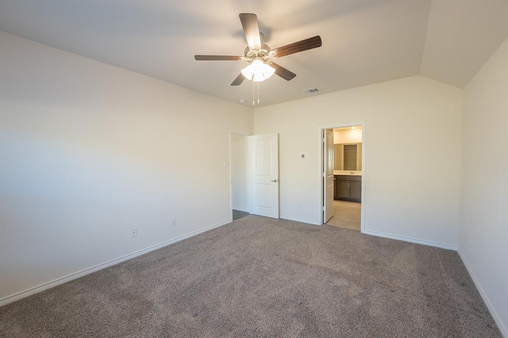 400 Willow View Way Princeton, TX 75407 - Photo 27 of 38 an empty room with closet and windows