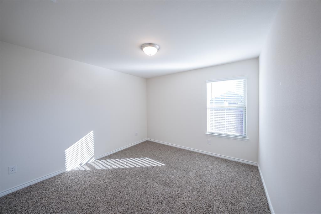 400 Willow View Way Princeton, TX 75407 - Photo 36 of 38 an empty room with a window