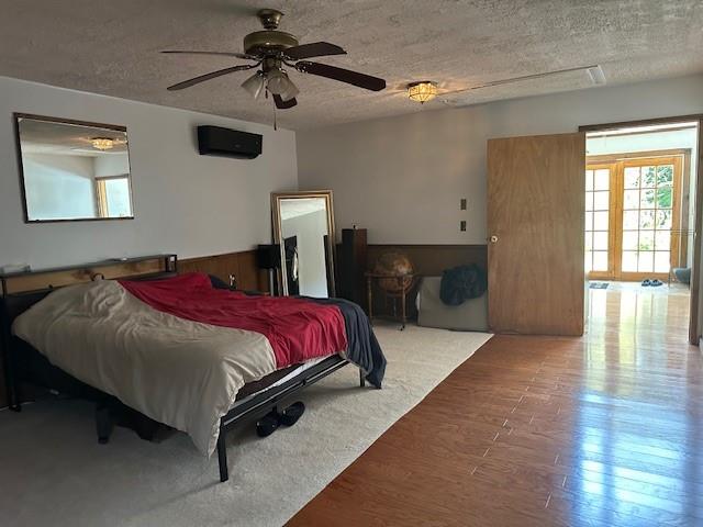 49 Hickory Drive Brewster, NY 10509 - Photo 11 of 17 a spacious bedroom with a bed and a chandelier