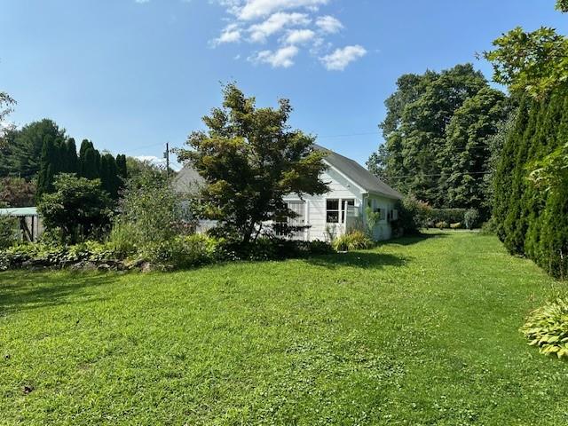 49 Hickory Drive Brewster, NY 10509 - Photo 16 of 17 a house view with a garden space