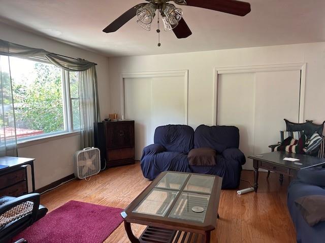 49 Hickory Drive Brewster, NY 10509 - Photo 4 of 17 a living room with furniture gym equipment and a large window