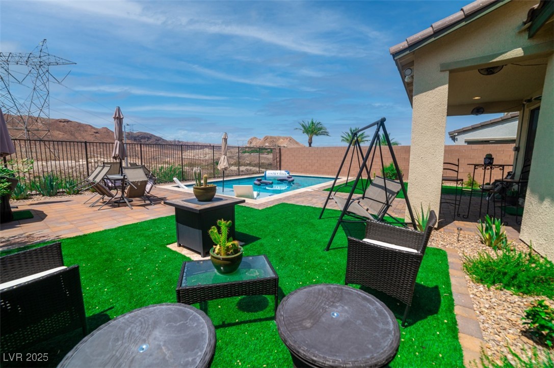 111 Verde Rosa Drive Henderson, NV 89011 - Photo 44 of 51 Fenced backyard with a patio area