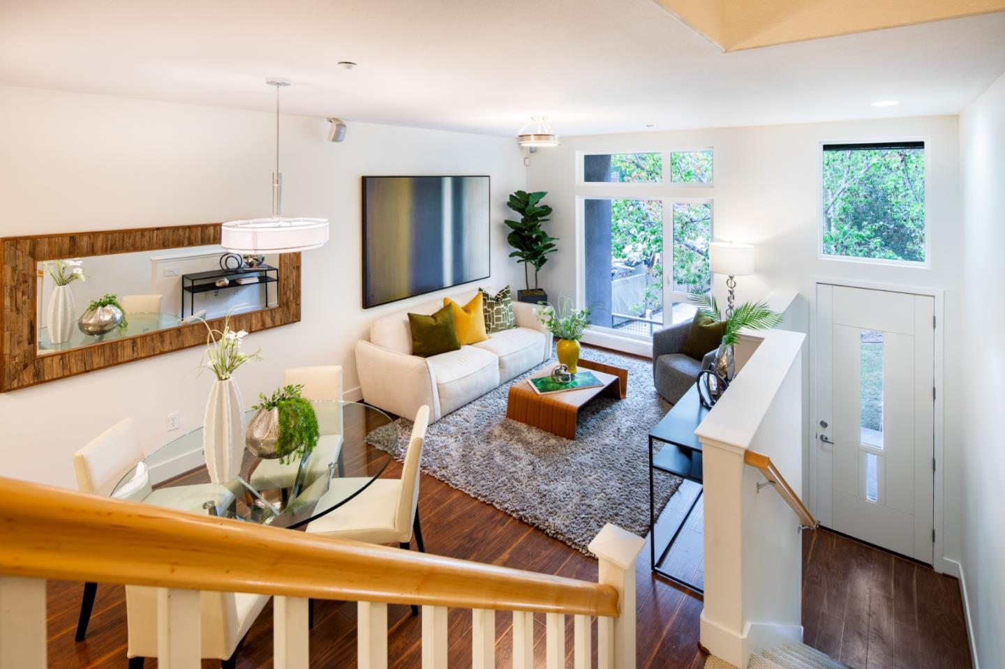 1003 Plover Lane Palo Alto, CA 94303 - Photo 1 of 14 a living room with furniture and wooden floor