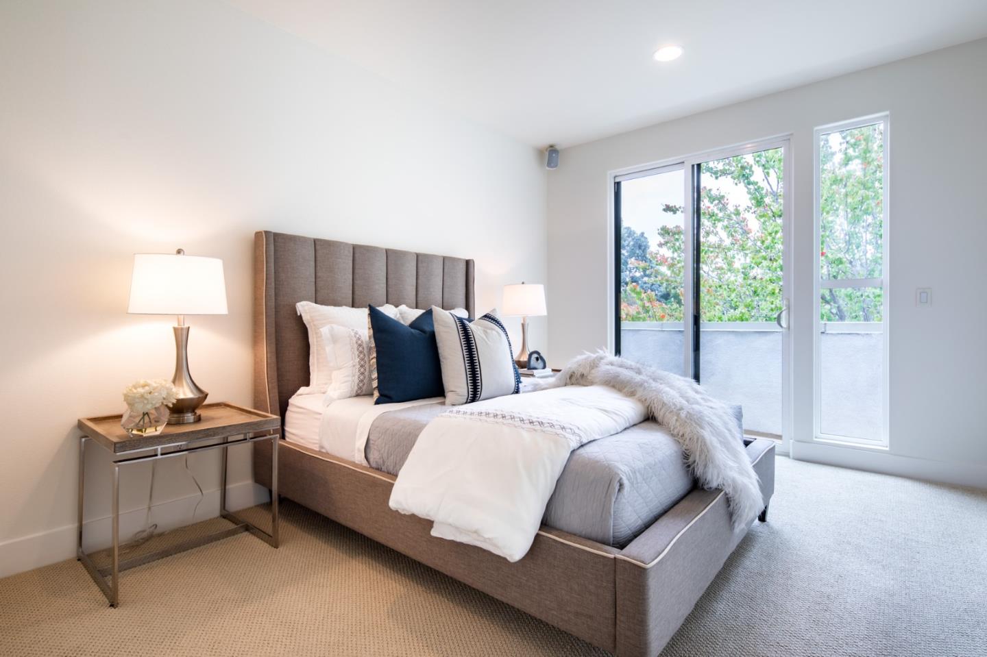 1003 Plover Lane Palo Alto, CA 94303 - Photo 11 of 14 a bed sitting in a bedroom next to a window