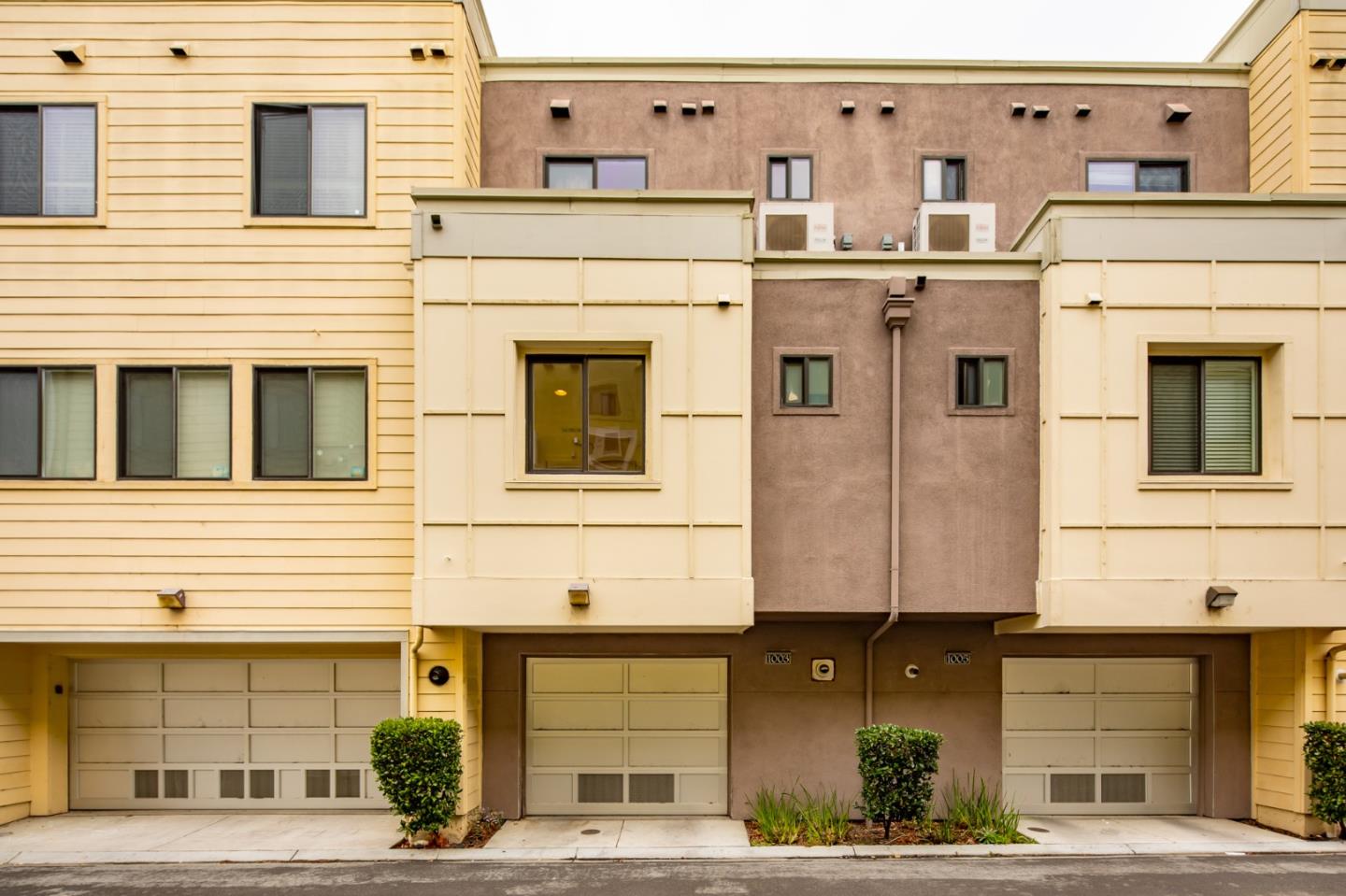 1003 Plover Lane Palo Alto, CA 94303 - Photo 14 of 14 a front view of a building with many windows