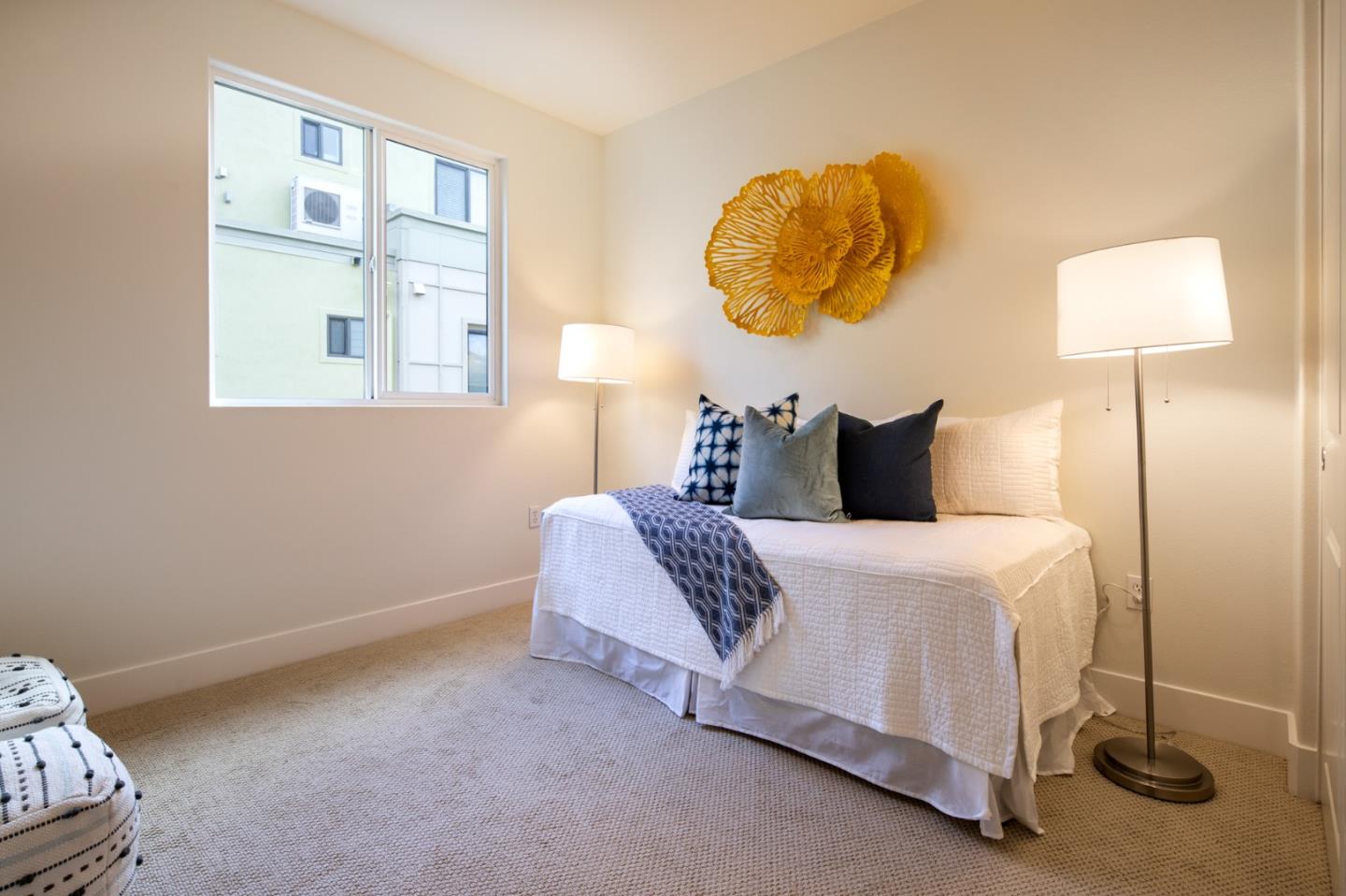 1003 Plover Lane Palo Alto, CA 94303 - Photo 6 of 14 a bedroom with a bed and lamp