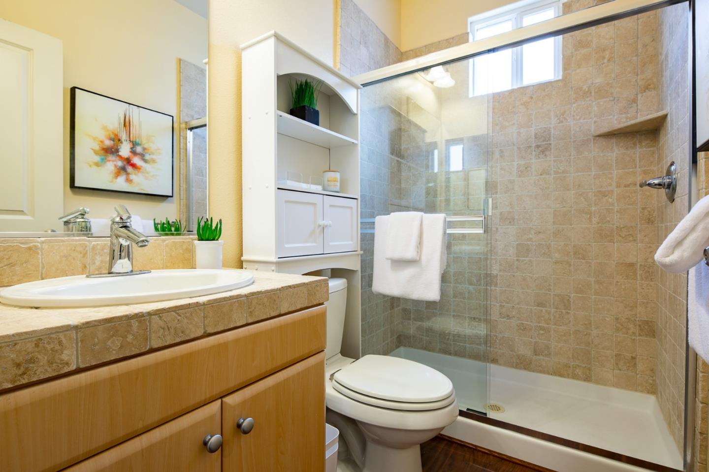 1003 Plover Lane Palo Alto, CA 94303 - Photo 7 of 14 a bathroom with a sink toilet and shower