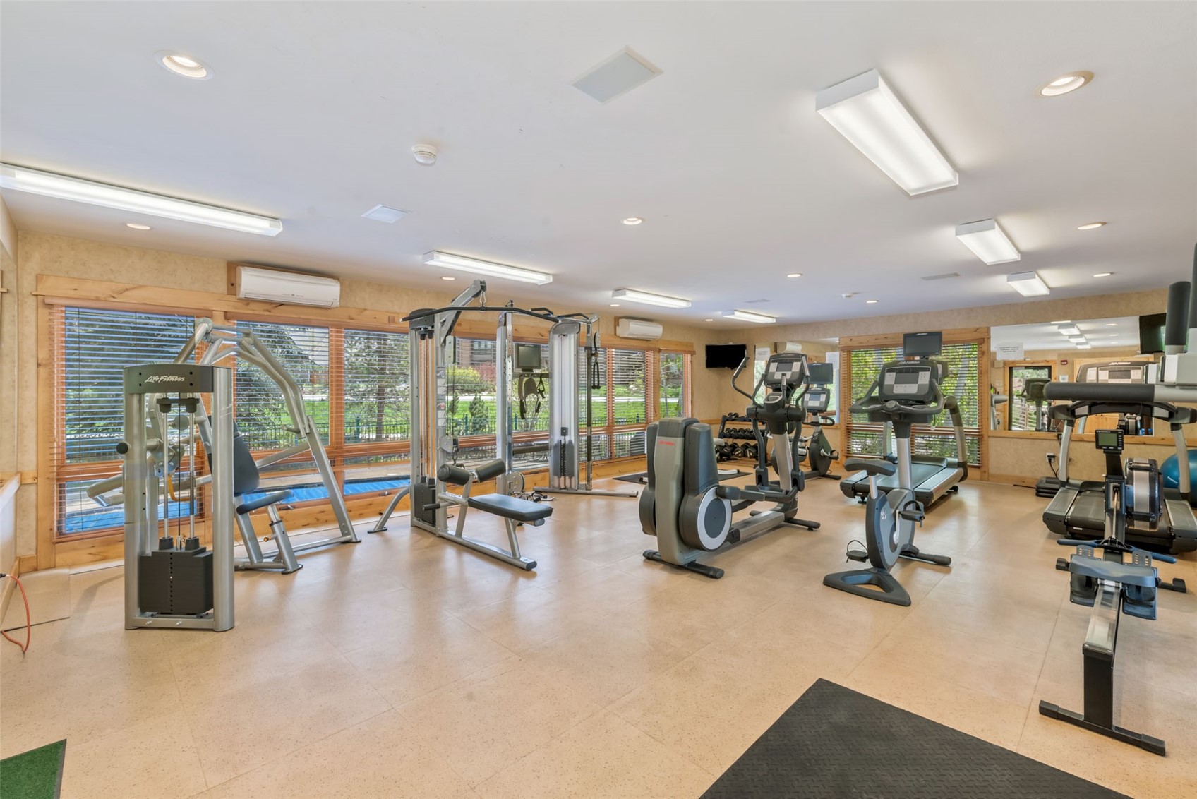 2720 Eagle Ridge Drive, Unit 207 Steamboat Springs, CO 80487 - Photo 33 of 37 a view of a room with gym equipment and a large window
