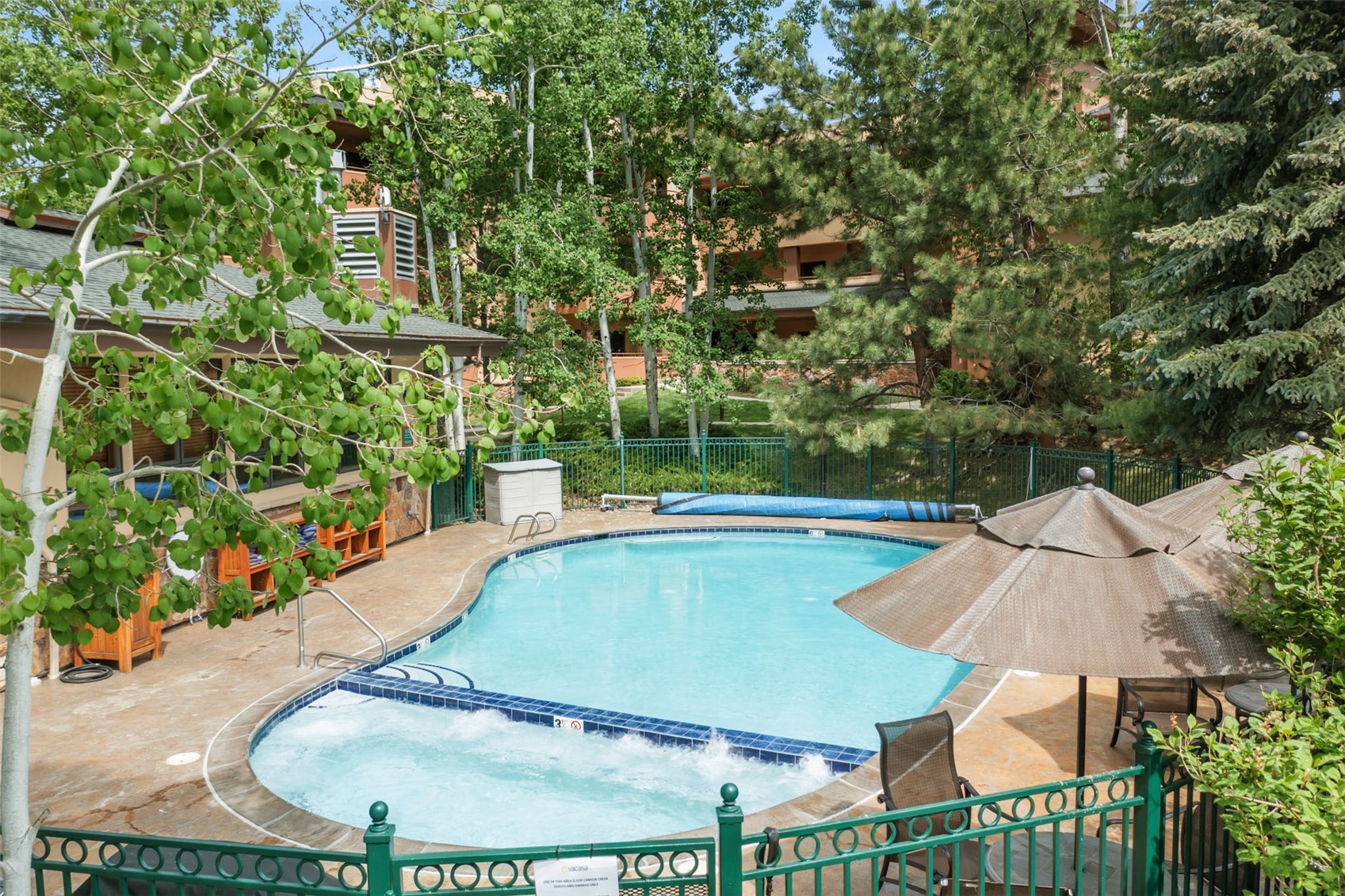 2720 Eagle Ridge Drive, Unit 207 Steamboat Springs, CO 80487 - Photo 35 of 37 a view of a swimming pool with a patio