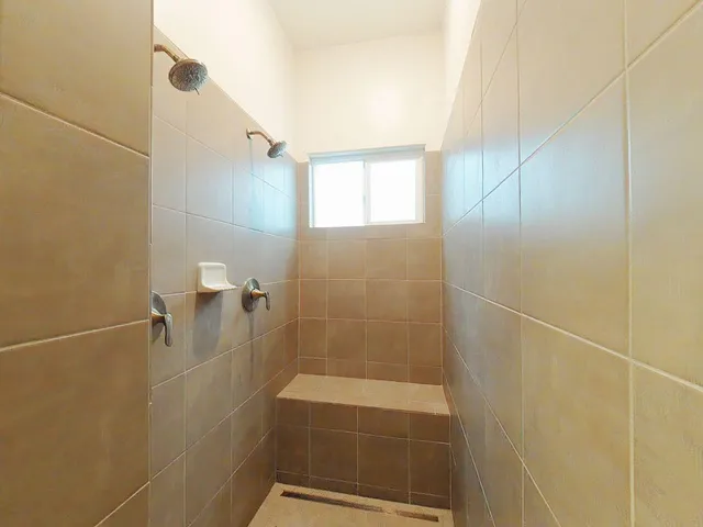 a view of a hallway with windows