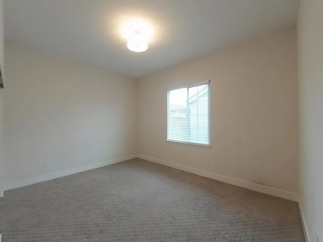 an empty room with an entryway