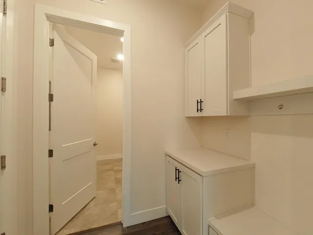 a bathroom with a double vanity sink mirror and double