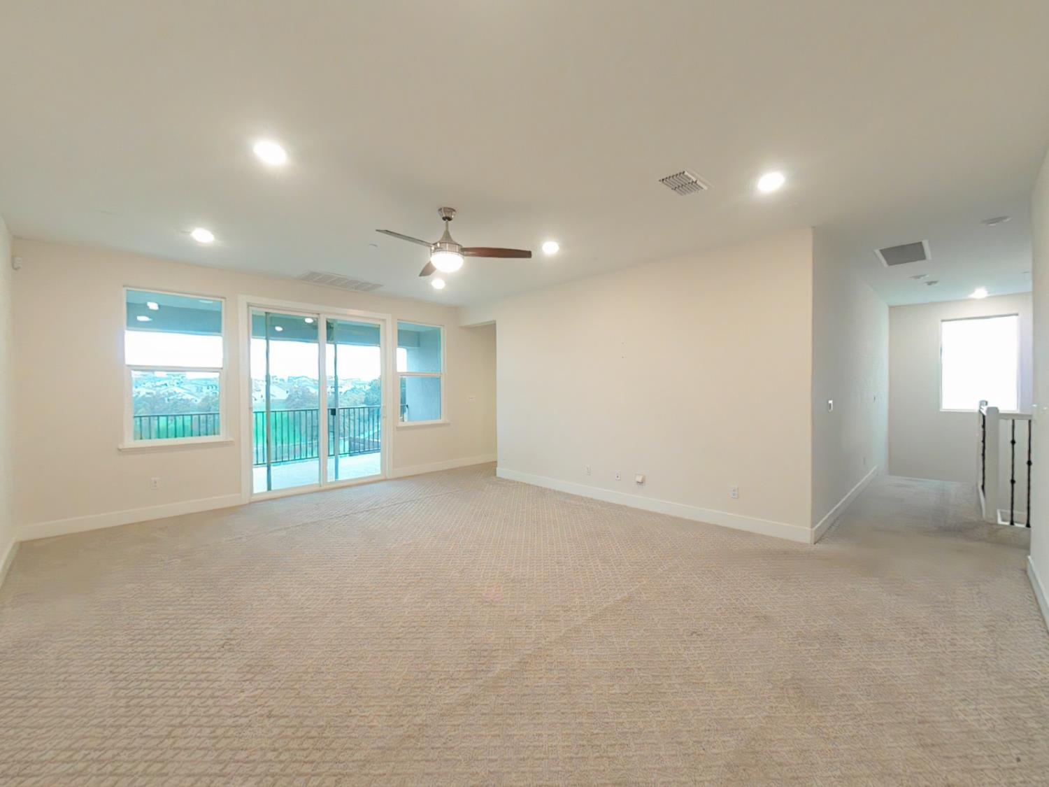 1236 Buck Ridge Rocklin, CA 95765 - Photo 44 of 66 a view of an empty room with a sliding door