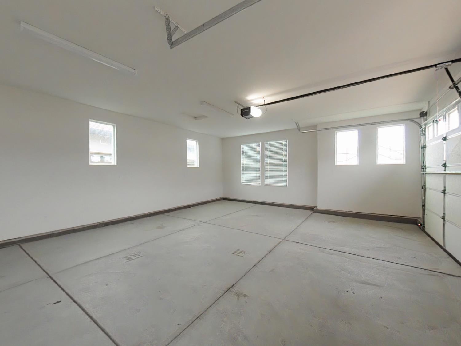 1236 Buck Ridge Rocklin, CA 95765 - Photo 64 of 66 an empty room with windows and closet