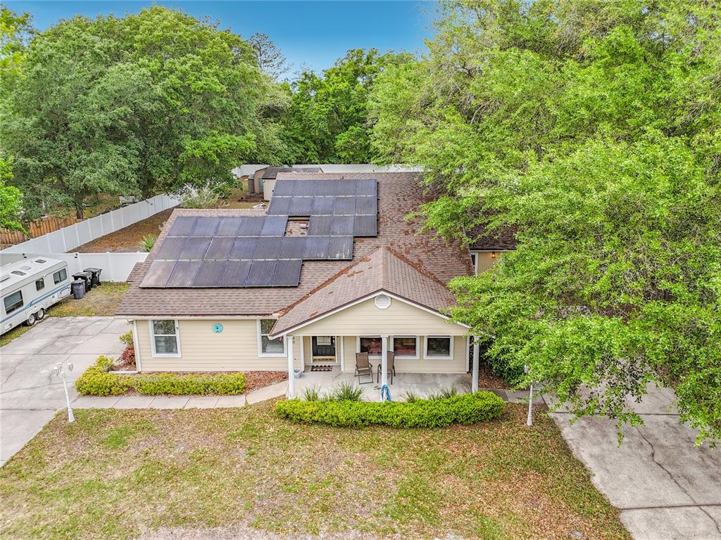 6380 Bahaia Road Fleming Island, FL 32003 - Photo 3 of 77 a front view of a house with a yard
