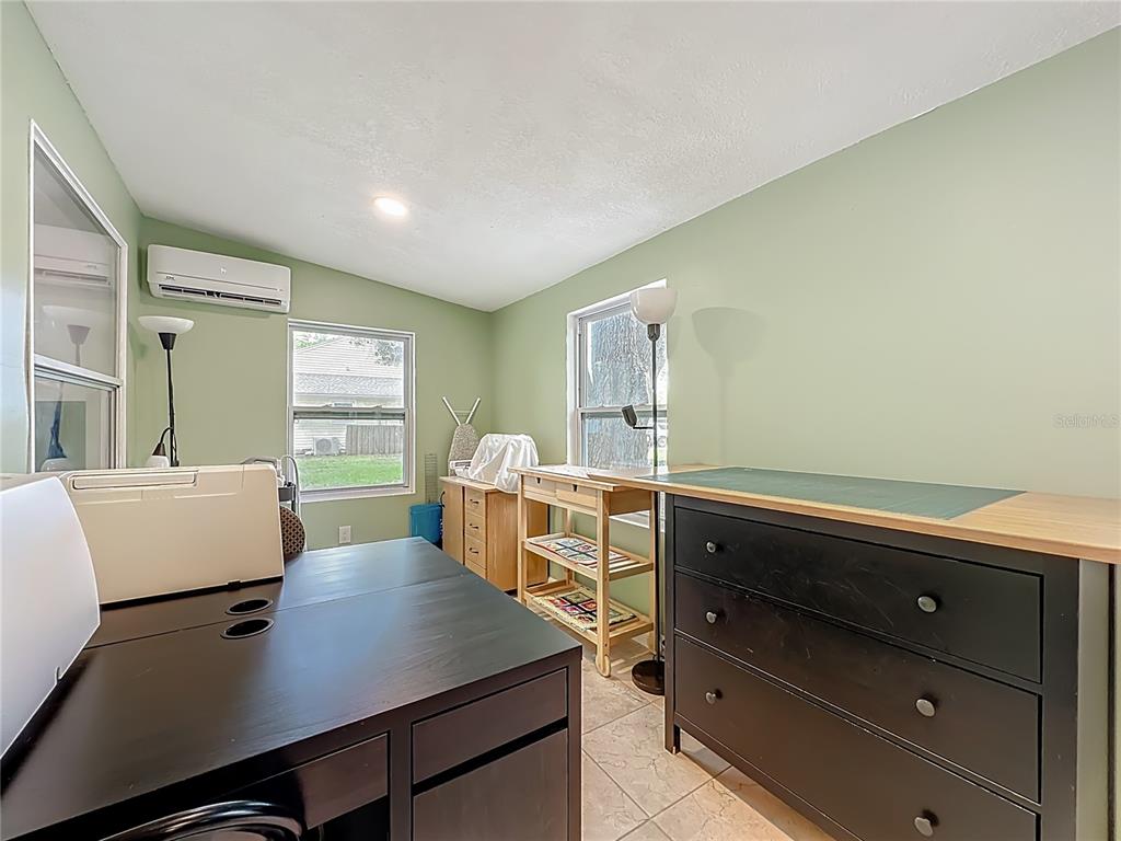 6380 Bahaia Road Fleming Island, FL 32003 - Photo 44 of 77 a view of a workspace with furniture