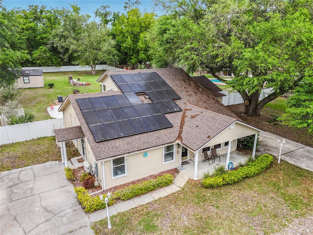 6380 Bahaia Road Fleming Island, FL 32003 - Photo 57 of 77 an aerial view of a house with a yard